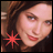 A woman with brown hair and red lipstick appears in three , each featuring a different colored starburst symbol