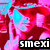 Pixelated image with vibrant red and pink background, cyan accents, and black text reading 'smexi' in a white block at bottom right.