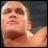 Static pixelated image of a person's face with light skin tone, brown eyes, and short hair against dark background.