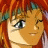A 48x48 pixel animated buddy icon featuring a close-up of an anime-style character with red hair and blue eyes on the left, paired with text reading "Anime IM" and "COM" on a black background to the right.