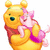 Yellow bear with green eyes and red shirt holds pink piglet in arms, both characters have closed eyes.