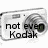 A silver digital camera with a green lens is shown in three , each displaying different text overlays
