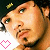 Animated contact sheet of a person wearing a black cap with yellow text, showing facial expression changes across seven frames with pink heart icons in the bottom-left corner.