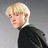 A pixelated image of a person with light hair in a dark robe against a gray background, with green text overlay reading "I love the sexy blondes just like Draco!".