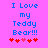 Pixelated blue text on bright pink background reads "I Love my Teddy Bear!!!" with red and pink heart symbols below.