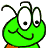 Pixelated green insect-like character with large white eyes, black pupils, and a curved smile on its face.