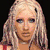 Four distinct celebrity portraits arranged in a , each with unique hair colors and styles against dark backgrounds