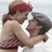 Two figures in a close embrace, one with red headwear and a sleeveless top, the other with dark hair, against a light background.