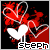 Pixelated red and white abstract design with a central white shape resembling a mask or face, surrounded by splattered patterns on black background.
