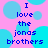 Pixelated text on a pink background with cyan circles reads "I love the jonas brothers" in blue letters, repeated across four identical