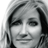 Black-and-white pixelated image of a person's face next to bold text reading LEE ANN WOMACK on a black background, displayed as part of an animated contact sheet with two frames.