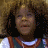 A 48x48 pixel buddy icon featuring a person with curly hair and a colorful top next to the word "honey" in blue block letters on a dark background.