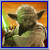 Static pixelated image of a green-skinned character with large ears and pointed head, wearing brown robes against an orange gradient background.