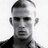 A pixelated grayscale portrait of a person with short hair on the left, next to orange text reading 'channing tatum (333)' on a solid blue background.