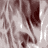 A grayscale animated icon shows a person with long wavy hair moving their head and mouth in a speaking motion.