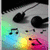 Pixelated static image shows a stylized face with large black eyes, a rainbow gradient background, and musical notes on the left side.
