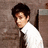 A pixelated image of a person in a white shirt and dark tie against a brown background, with pink text reading SEXY!!! appearing on the right side.