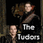 Pixelated image of two figures with brown hair against dark background, featuring white text reading 'The Tudors' in blocky font.