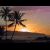 Pixelated sunset scene with palm trees on left, orange text 'California Dreaming' in black frame on right.