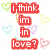 Pixelated red text reads "i think in in love?" with four heart shapes surrounding it on a white background.