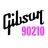 Pixelated black script text 'Gibson' with pink '90210' below on white background.