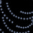 A 48x48 pixel animated icon featuring a grayscale abstract motion pattern with shifting light and dark shapes on a black background, displayed as two sequential frames in a contact sheet layout.