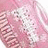Pixelated pink and white fabric texture with pixelated text on a bright pink background.