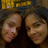 Two pixelated faces in close-up, side-by-side, with neutral expressions against a dark background and yellow top border.