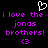 Black background with purple pixelated text reading "i love the jonas brothers!" and a pink heart symbol above, repeated twice side-by-side.