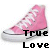 Pink high-top sneakers with white laces and black trim, each paired with 'True Love' text and a heart symbol in varying colors.