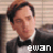 A man in a black tuxedo with white shirt and bow tie appears , each showing slight variations in head position and text color beneath his chin