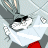 A 48x48 pixel animated contact sheet showing two frames of a gray cartoon rabbit character with black sunglasses, white muzzle, red mouth, and red chest patch against a light gray background.