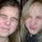 Two side-by-side pixelated faces with light skin tones, dark hair, and neutral expressions against a muted background.