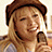 A pixelated image shows a person with long blonde hair wearing a brown cap and holding a microphone, overlaid with a red X on the right side and red text reading "hilary haters" below.