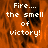Pixelated orange and black background with white text reading "Fire... the smell of victory!" in a