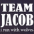 Dark background with white text reading "TEAM TEAM JACOB JACOB" and smaller gray text below stating "I run with wolves. I run with wolves." repeated twice.