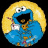 Blue monster with white eyes and orange nose inside yellow circular frame on black background, next to purple with red 'Cookie' text above blue 'monstep' text