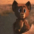 Pixelated cartoon character with brown fur, large ears, and a light brown muzzle stands against a gradient background transitioning from orange to brown.