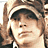 A 48x48 pixel animated contact sheet showing three frames of a cartoon-style character with long brown hair, wearing a cap and dark clothing, displayed in a 2x2 grid layout with one empty gray cell.