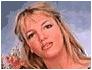 Three distinct frames of a Britney Spears image: top-left shows her with blonde hair and pinkish skin against blue sky, top-right is black-and-white close-up with partial text, bottom frame depicts her in studio wearing white shirt near microphone.