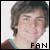Pixelated static image of a person's face with the word "FAN" in blocky text at bottom right, set against a light background.