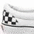 Black-and-white checkered slip-on shoe with visible sole and side , paired with text reading "Oh Yeah." on a black background