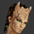 Pixelated close-up of a person's face with brown hair, visible ear, and light skin tone against dark background.