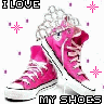 Pixelated pink high-top sneakers with white laces and soles, surrounded by text and star symbols on a white background.