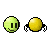 Animated sequence of green and yellow circular figures with black vertical lines on faces, some showing red mouth areas or brown branch-like extensions.