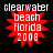 Red starburst shape with white text 'clearwater beach florida 2008' on black background, four identical static frames displayed in a