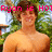 Pixelated image of a shirtless person with brown hair against a green and blue background, overlaid with pink text reading "Ryan is Hot".