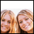 Static 48x48 pixel icon showing two identical cartoon-style female faces with blonde hair and closed eyes, side-by-side on a white background.