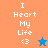 Pixelated text "I Heart My Life <3" on split background with blue star and orange star icons.