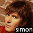 Four celebrity headshots arranged in a with text labels beneath each, showing Simon, Nick, John, and Roger